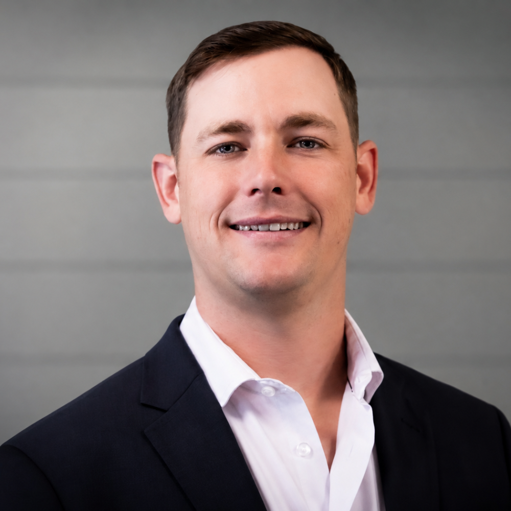 Professional headshot of a Hamilton Legacy Realty team member in Johnson County, Texas.
